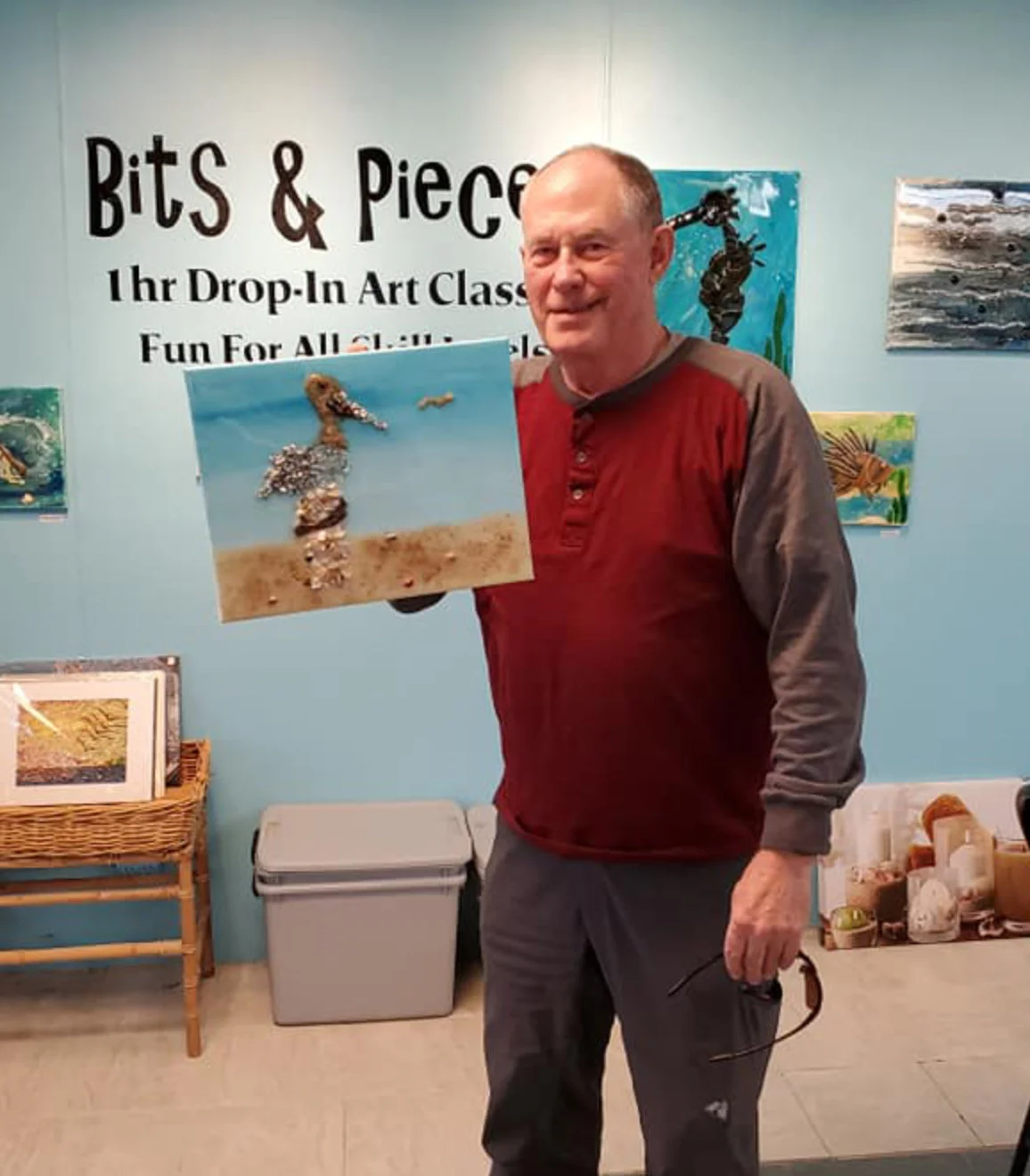 Man showing off his finished project at Art of Glass SGI